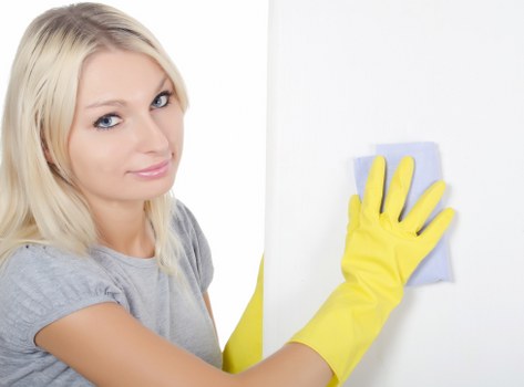 Team member wearing PPE during a deep cleaning job in Clapham