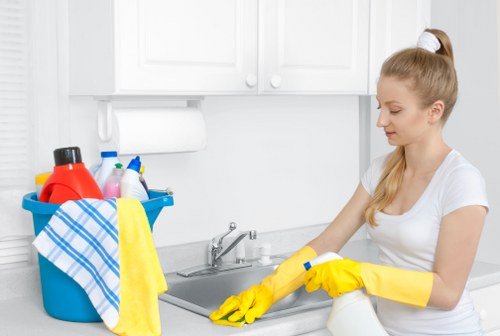 Kitchen surfaces being cleaned in a Clapham household domestic cleaning service