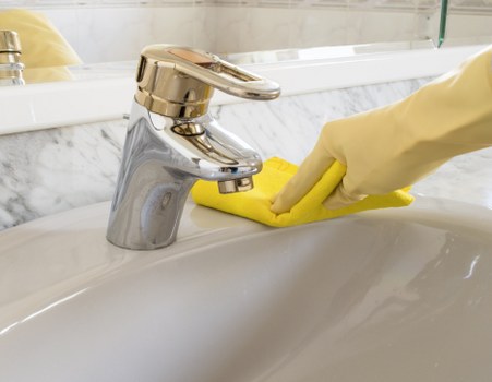 Team member checking surfaces and equipment during a deep clean